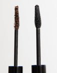 Two mascara wands, one with a black tip and one with a brown tip, against a white background, representing the black and brown bundle product.