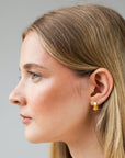 Fair skinned model wears Real Depth Multi Purpose Lip And Face Stick